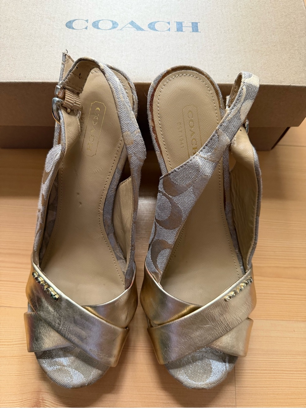 Coach Signature Monogram Logo Gold Wedge Sandals
Women's Size 8